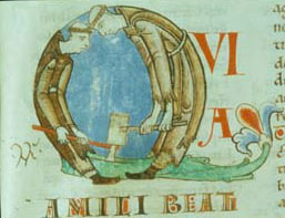 The initial'Q' from the Moralia in Job shows two monks splitting a log. © Bibliotheque Municipal, Dijon<click to enlarge> 