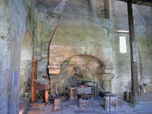 Interior of the forge at Fontenay, showing the forge itself