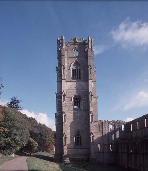Photograph showing the Huby's tower from west of the abbey church at Fountains