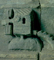 Stone carving of a mill